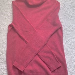 Pink cashmere sweater.